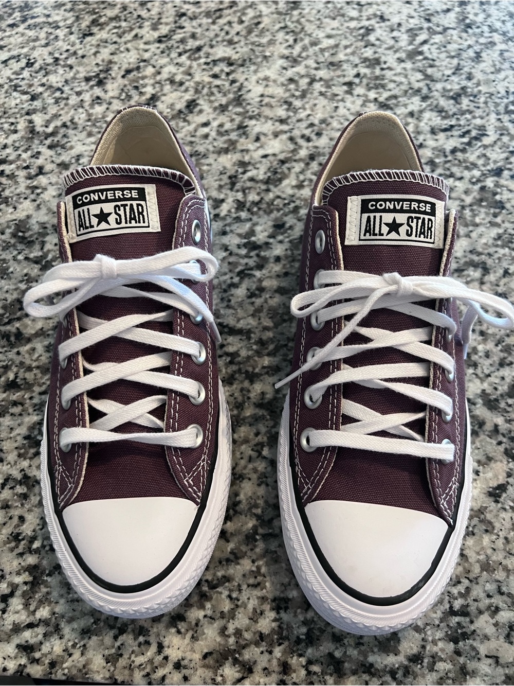 Woman’s Converse Low Top Sneakers in Plum color 7.5
